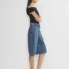Werbung Denim-Shorts unterhalb des Knies Werbung Denim-Shorts unterhalb des Knies
